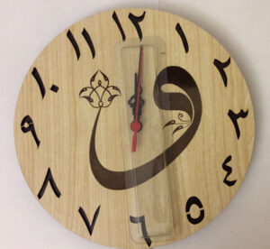 Wallmount clock with Arabic numerals